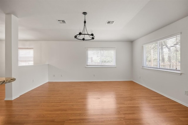 3710 Castle Rock Dr, Round Rock, TX 78681 - unfurnished room featuring a chandelier and light wood-style flooring