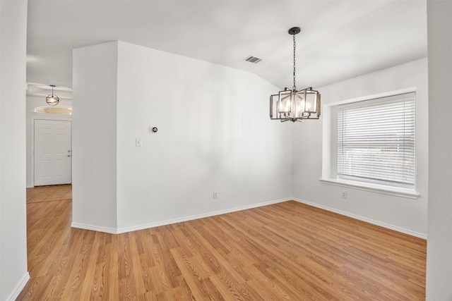 3710 Castle Rock Dr, Round Rock, TX 78681 - spare room featuring a chandelier, light wood-style flooring, and lofted ceiling