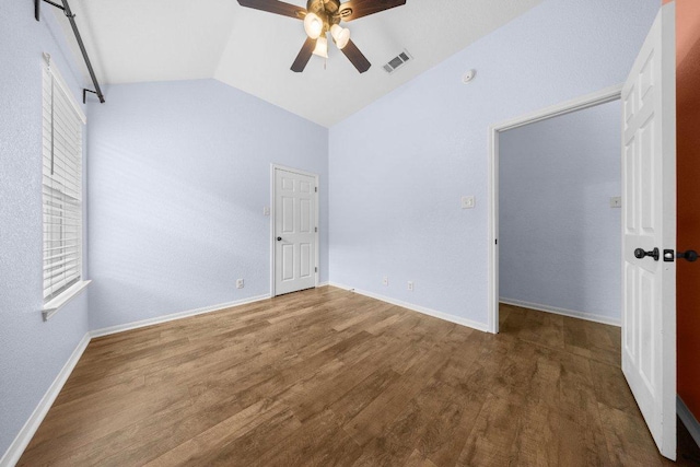 1409 Castle Ridge Dr, Harker Heights, TX 76548 - unfurnished bedroom featuring vaulted ceiling, wood finished floors, and a ceiling fan