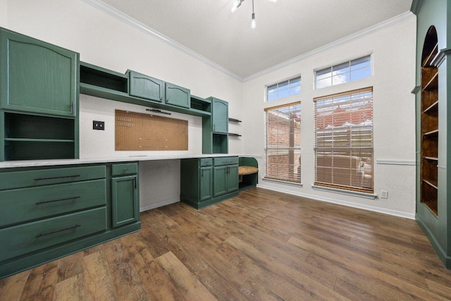1409 Castle Ridge Dr, Harker Heights, TX 76548 - kitchen with green cabinetry, open shelves, crown molding, dark wood-type flooring, and built in desk
