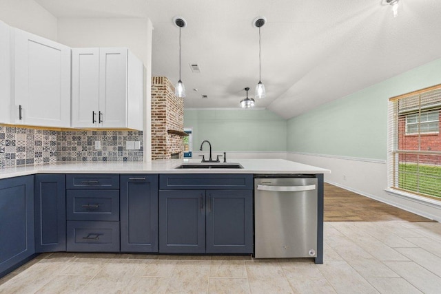1409 Castle Ridge Dr, Harker Heights, TX 76548 - kitchen featuring stainless steel dishwasher, a peninsula, white cabinets, light countertops, and hanging light fixtures