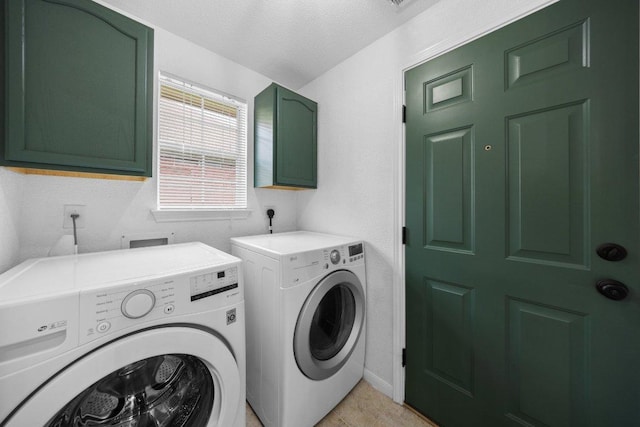 1409 Castle Ridge Dr, Harker Heights, TX 76548 - laundry area with cabinet space and washing machine and dryer