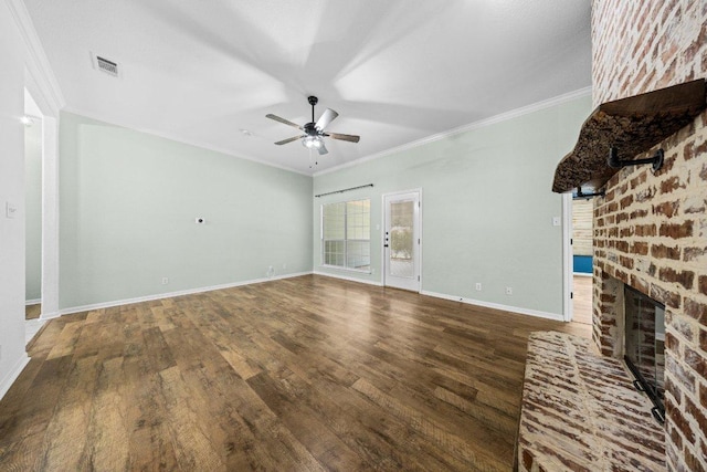 1409 Castle Ridge Dr, Harker Heights, TX 76548 - unfurnished living room featuring wood finished floors, a ceiling fan, ornamental molding, and a brick fireplace