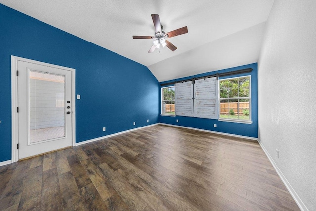1409 Castle Ridge Dr, Harker Heights, TX 76548 - empty room with wood finished floors, vaulted ceiling, and ceiling fan