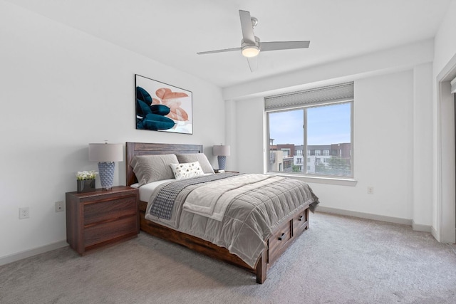 3600 S Lamar Blvd Unit 501, Austin, TX 78704 - carpeted bedroom with baseboards and a ceiling fan