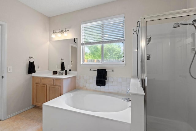 16907 Cranston Dr, Round Rock, TX 78664 - full bath featuring a stall shower, a bath, vanity, and tile patterned floors