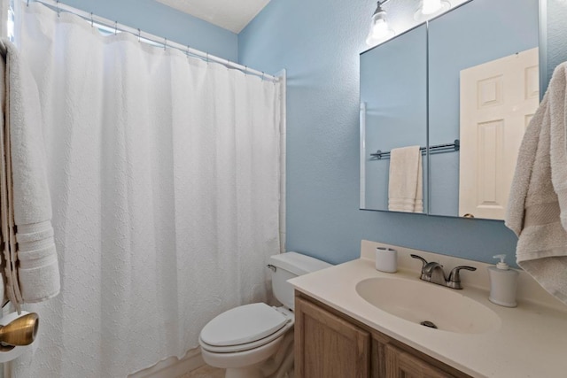 16907 Cranston Dr, Round Rock, TX 78664 - full bathroom with vanity, a shower with shower curtain, and a textured wall