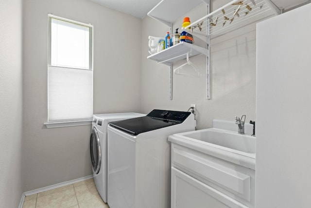 16907 Cranston Dr, Round Rock, TX 78664 - laundry room featuring independent washer and dryer and light tile patterned floors