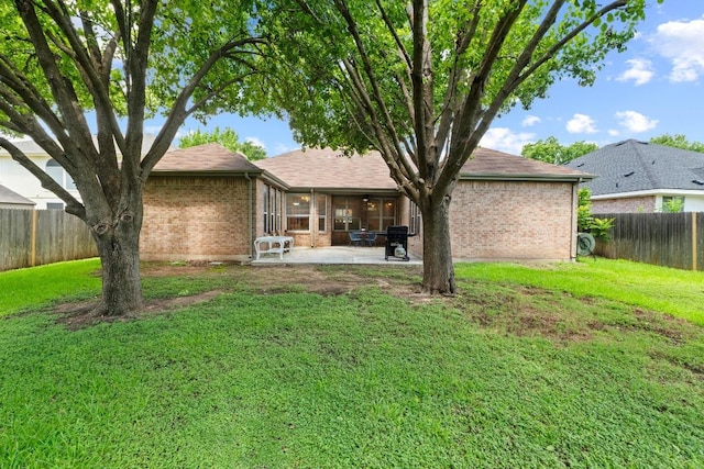 16907 Cranston Dr, Round Rock, TX 78664 - back of house featuring brick siding, a patio, and a fenced backyard