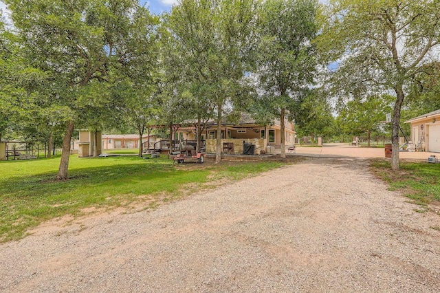 195 Heritage Oaks Dr, Cedar Creek, TX 78612 - view of front of house featuring a front yard