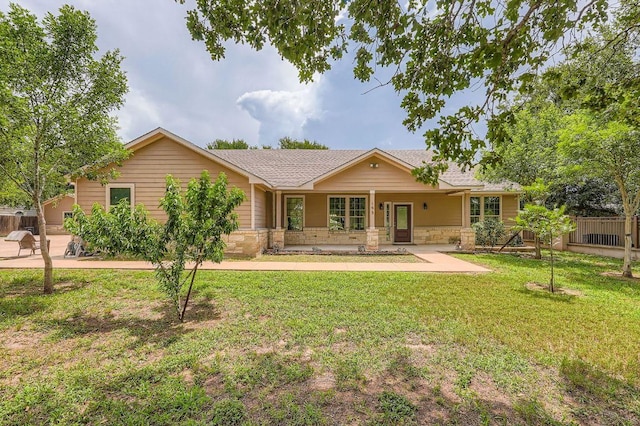 195 Heritage Oaks Dr, Cedar Creek, TX 78612 - back of property with a shingled roof and stone siding