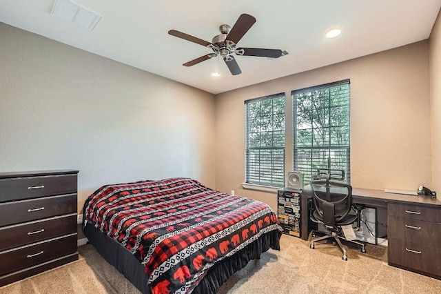 195 Heritage Oaks Dr, Cedar Creek, TX 78612 - bedroom with light colored carpet, recessed lighting, a ceiling fan, and a desk