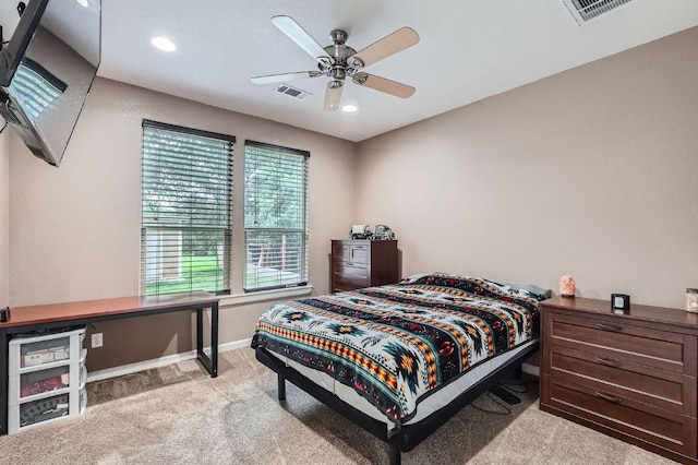195 Heritage Oaks Dr, Cedar Creek, TX 78612 - bedroom with light carpet, recessed lighting, and a ceiling fan