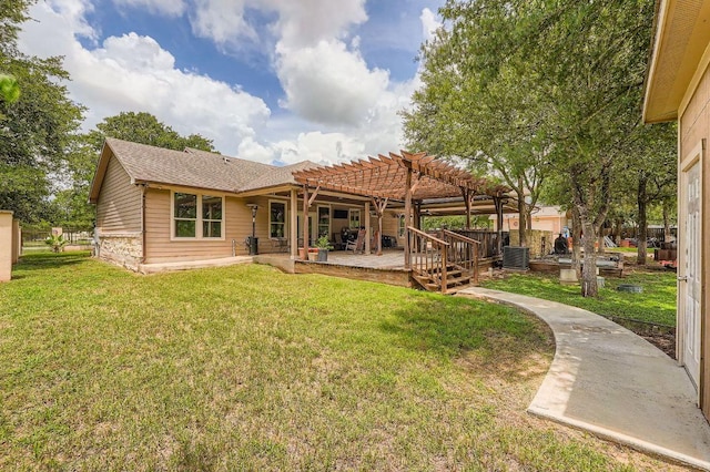 195 Heritage Oaks Dr, Cedar Creek, TX 78612 - rear view of house with a pergola, a yard, and a patio