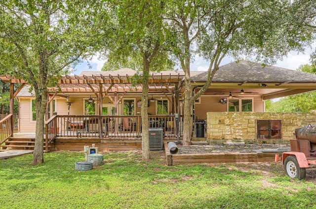 195 Heritage Oaks Dr, Cedar Creek, TX 78612 - rear view of house featuring ceiling fan, a lawn, and a pergola