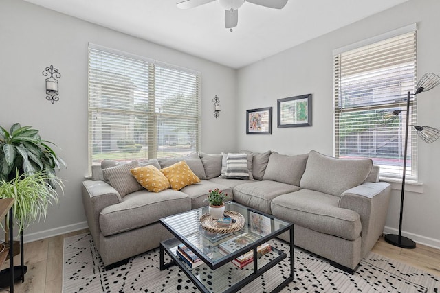1201 Grove Blvd Unit 2203, Austin, TX 78741 - living room featuring ceiling fan and light wood finished floors