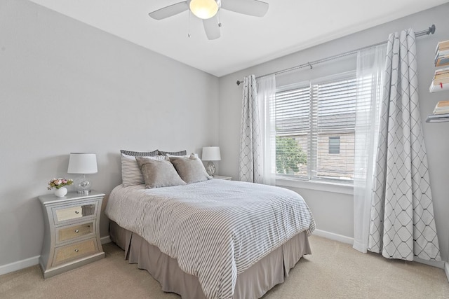 1201 Grove Blvd Unit 2203, Austin, TX 78741 - bedroom featuring light carpet and a ceiling fan