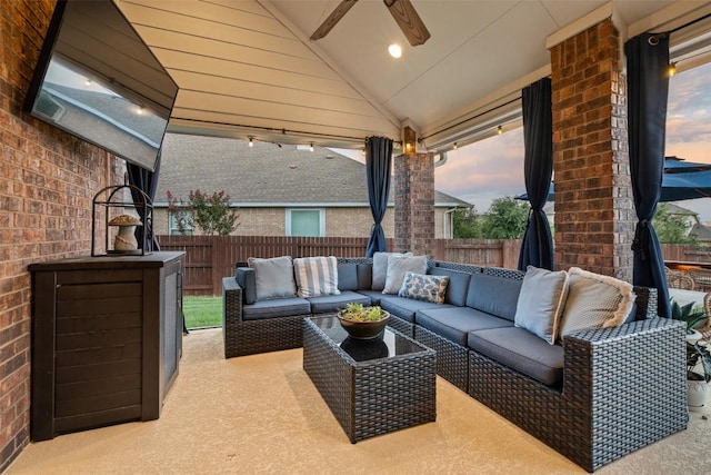 4539 Miraval Loop, Round Rock, TX 78665 - patio terrace at dusk with an outdoor living space, ceiling fan, and a patio