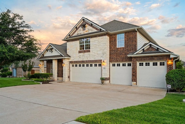 4539 Miraval Loop, Round Rock, TX 78665 - view of front of house featuring stone siding, a garage, concrete driveway, a yard, and a shingled roof
