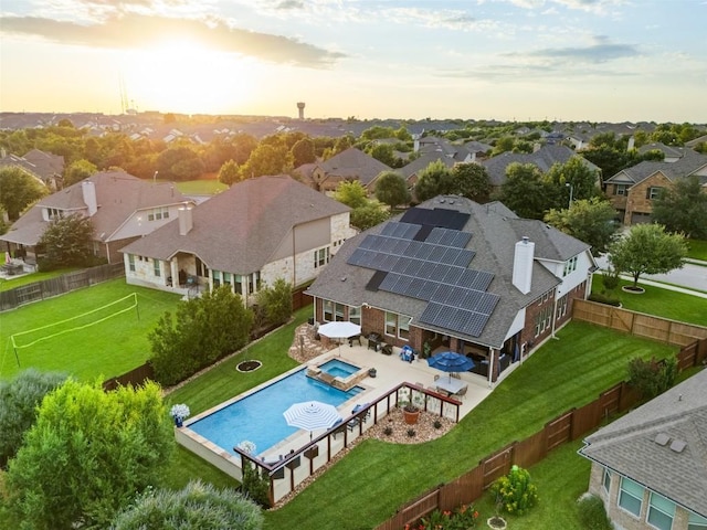 4539 Miraval Loop, Round Rock, TX 78665 - aerial view at dusk of view of pool and a residential view