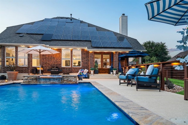 4539 Miraval Loop, Round Rock, TX 78665 - outdoor pool with an outdoor hot tub and a patio