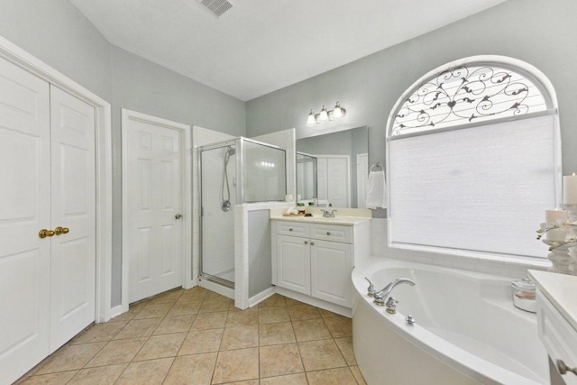 1224 Fall Creek Loop, Cedar Park, TX 78613 - bathroom with vanity, a shower stall, and a bath
