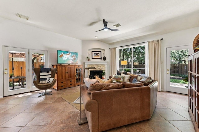 1224 Fall Creek Loop, Cedar Park, TX 78613 - tiled living area featuring ceiling fan and a fireplace