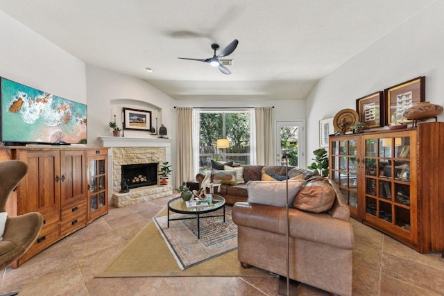 1224 Fall Creek Loop, Cedar Park, TX 78613 - living area featuring ceiling fan and a stone fireplace