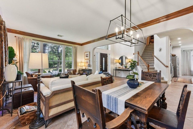 1224 Fall Creek Loop, Cedar Park, TX 78613 - dining space featuring arched walkways, crown molding, stairway, and a chandelier