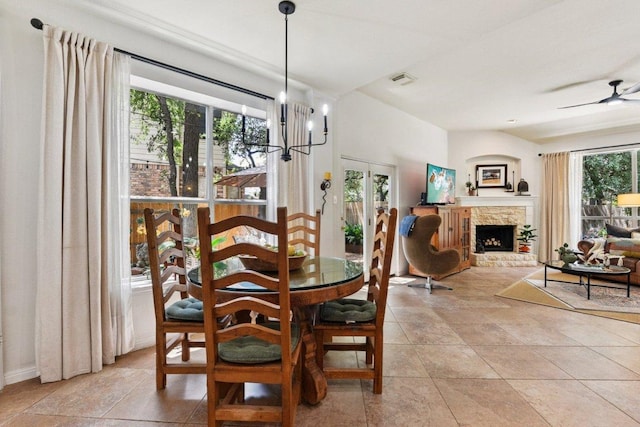 1224 Fall Creek Loop, Cedar Park, TX 78613 - dining space featuring a stone fireplace and ceiling fan
