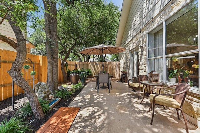 1224 Fall Creek Loop, Cedar Park, TX 78613 - fenced backyard featuring a patio and outdoor dining area