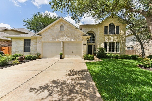 1224 Fall Creek Loop, Cedar Park, TX 78613 - view of front of property featuring stone siding, a garage, and concrete driveway