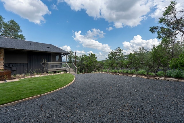 701 Terrace Mountain Dr, West Lake Hills, TX 78746 - view of green lawn with gravel driveway and a deck