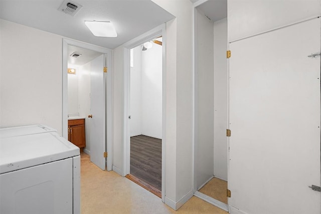 7923 Brockman St, Austin, TX 78757 - washroom featuring washer and dryer and baseboards
