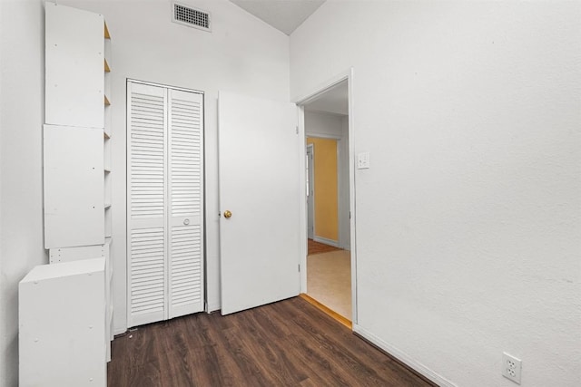 7923 Brockman St, Austin, TX 78757 - unfurnished bedroom featuring wood finished floors and a closet