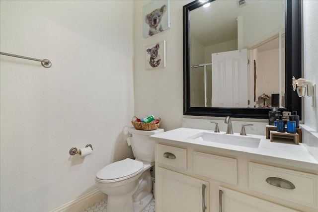bathroom with vanity and tile patterned floors