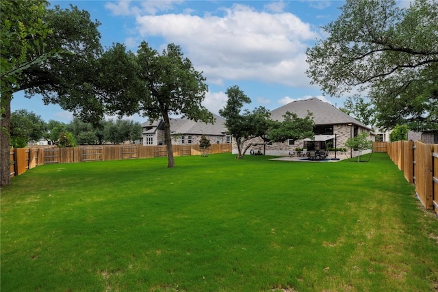 4644 Arques Ave, Round Rock, TX 78681 - fenced backyard with a patio area