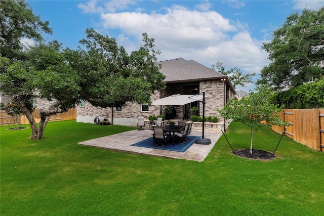 4644 Arques Ave, Round Rock, TX 78681 - fenced backyard with a patio area