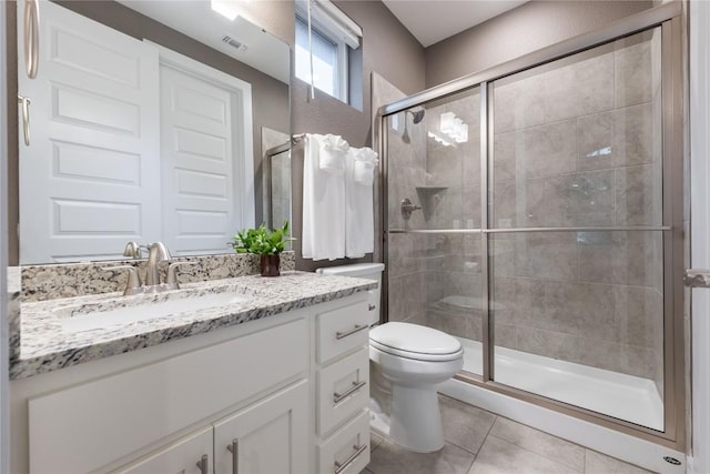 4644 Arques Ave, Round Rock, TX 78681 - bathroom with vanity, a stall shower, and tile patterned floors