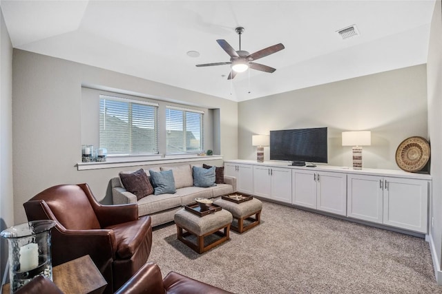 4644 Arques Ave, Round Rock, TX 78681 - living area with ceiling fan, light carpet, and vaulted ceiling