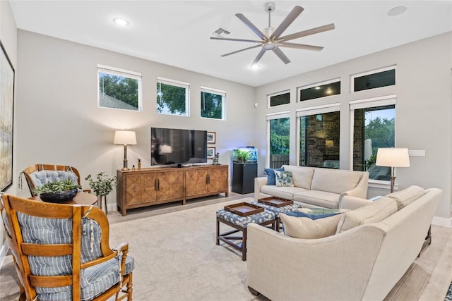 4644 Arques Ave, Round Rock, TX 78681 - living area with a ceiling fan, recessed lighting, and light wood-style floors