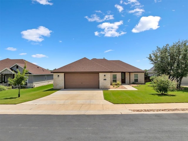 208 Rachel Loop, Burnet, TX 78611 - view of front of home featuring a garage, concrete driveway, a front yard, and brick siding