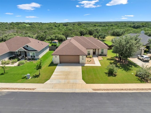 208 Rachel Loop, Burnet, TX 78611 - view from above of property with a heavily wooded area