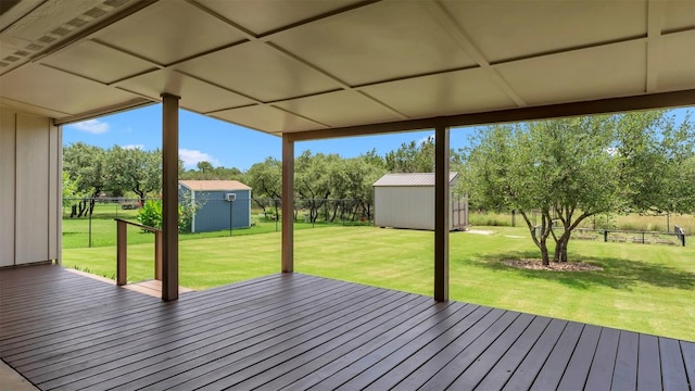 208 Rachel Loop, Burnet, TX 78611 - wooden terrace featuring a shed and a fenced backyard