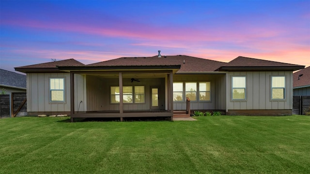 208 Rachel Loop, Burnet, TX 78611 - back of property featuring board and batten siding and a shingled roof