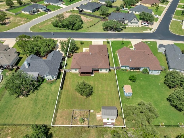 208 Rachel Loop, Burnet, TX 78611 - aerial view of property and surrounding area featuring nearby suburban area and property parcel outlined