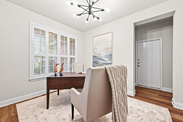 10421 Beard Ave, Austin, TX 78748 - office space featuring wood finished floors and a chandelier