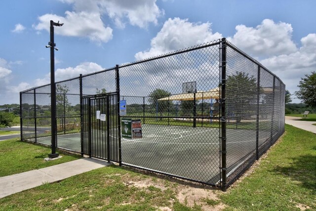 10421 Beard Ave, Austin, TX 78748 - view of tennis court with a gate