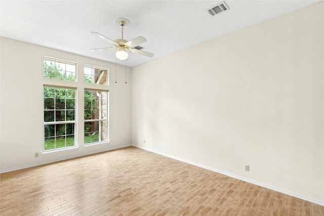 1212 Dove Cir, Cedar Park, TX 78613 - empty room featuring light wood-style flooring and a ceiling fan
