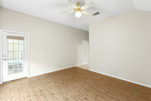 1212 Dove Cir, Cedar Park, TX 78613 - spare room featuring light wood-type flooring, a ceiling fan, and lofted ceiling